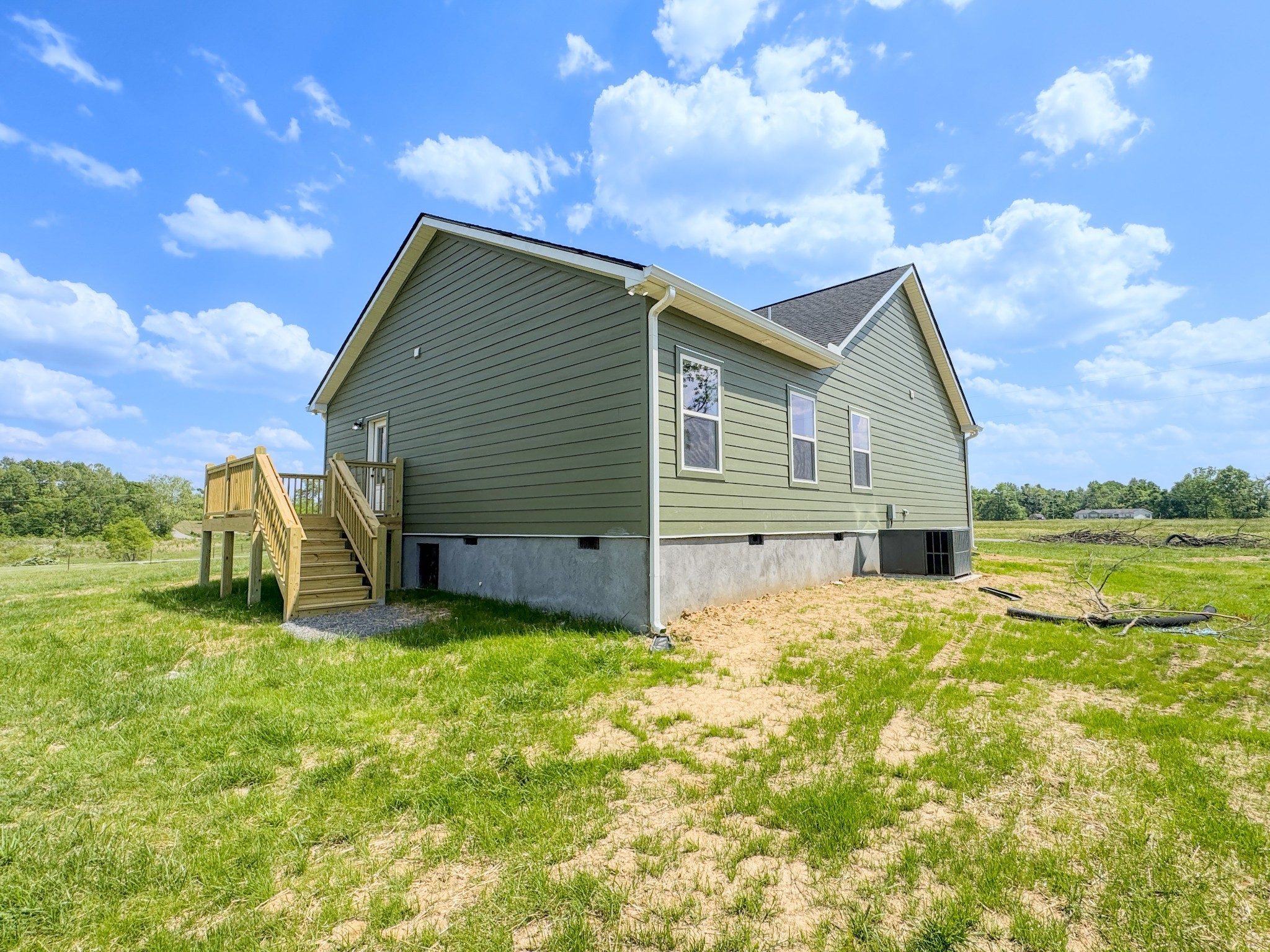 181 Rock House Hollow Road Bethpage, TN 37022 - Photo 7 of 51 a view of a house with a yard