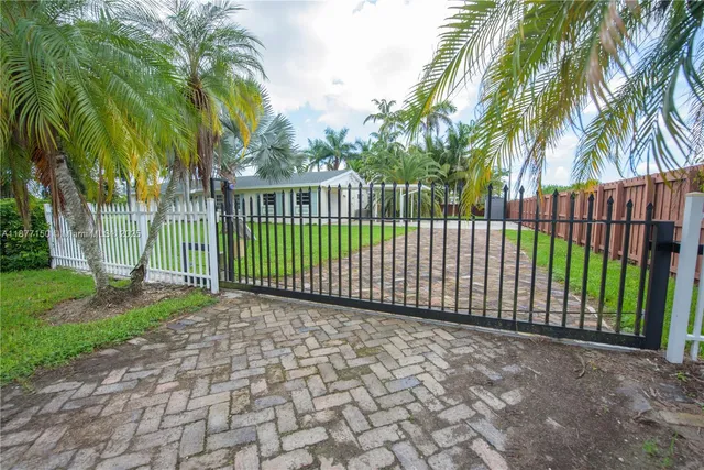 a view of a backyard with a garden