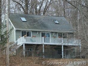 195 Middlesex Avenue Chester, CT 06412 - Photo 1 of 1 a front view of a house with balcony
