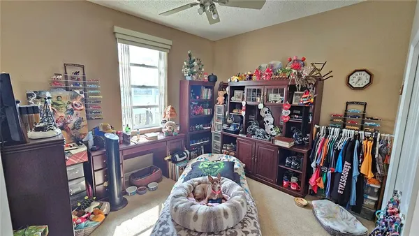 a living room with lots of furniture and toys