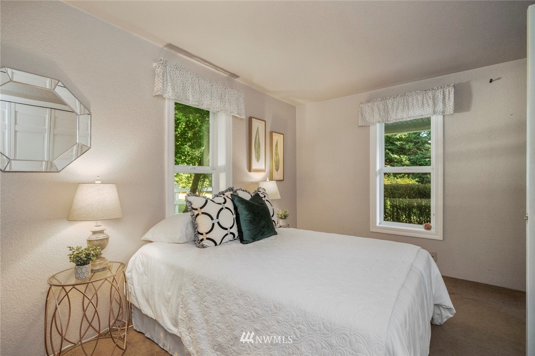 1125 Dyer Road Sultan, WA 98294 - Photo 12 of 22 a bedroom with a bed and a window