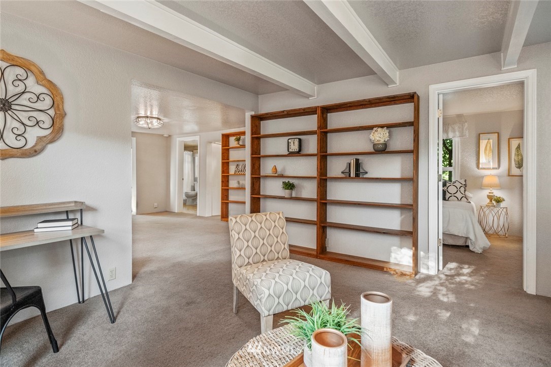 1125 Dyer Road Sultan, WA 98294 - Photo 13 of 22 a living room with furniture and a chair