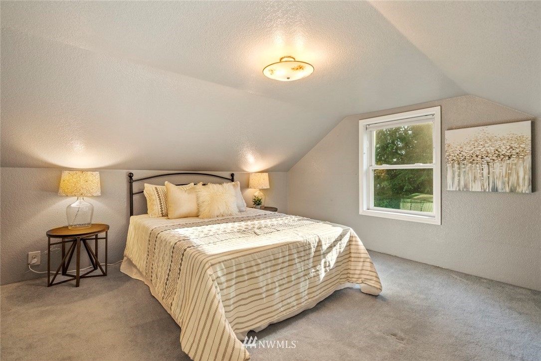 1125 Dyer Road Sultan, WA 98294 - Photo 15 of 22 a bedroom with a bed and a window