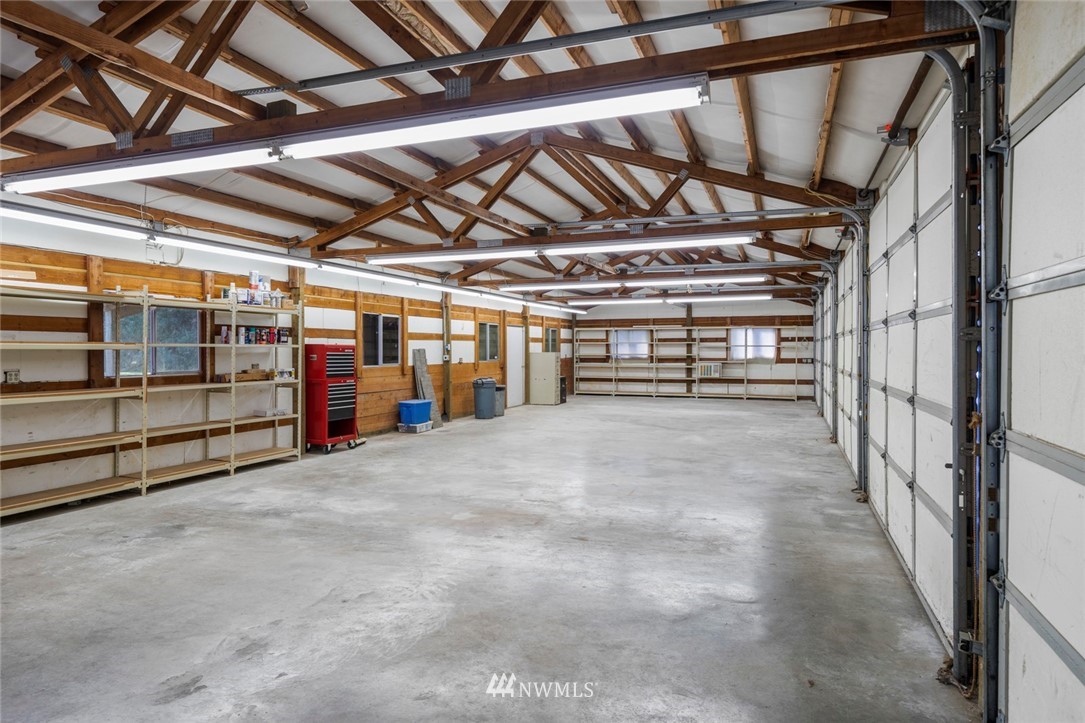 1125 Dyer Road Sultan, WA 98294 - Photo 16 of 22 a view of an empty room with wooden roof