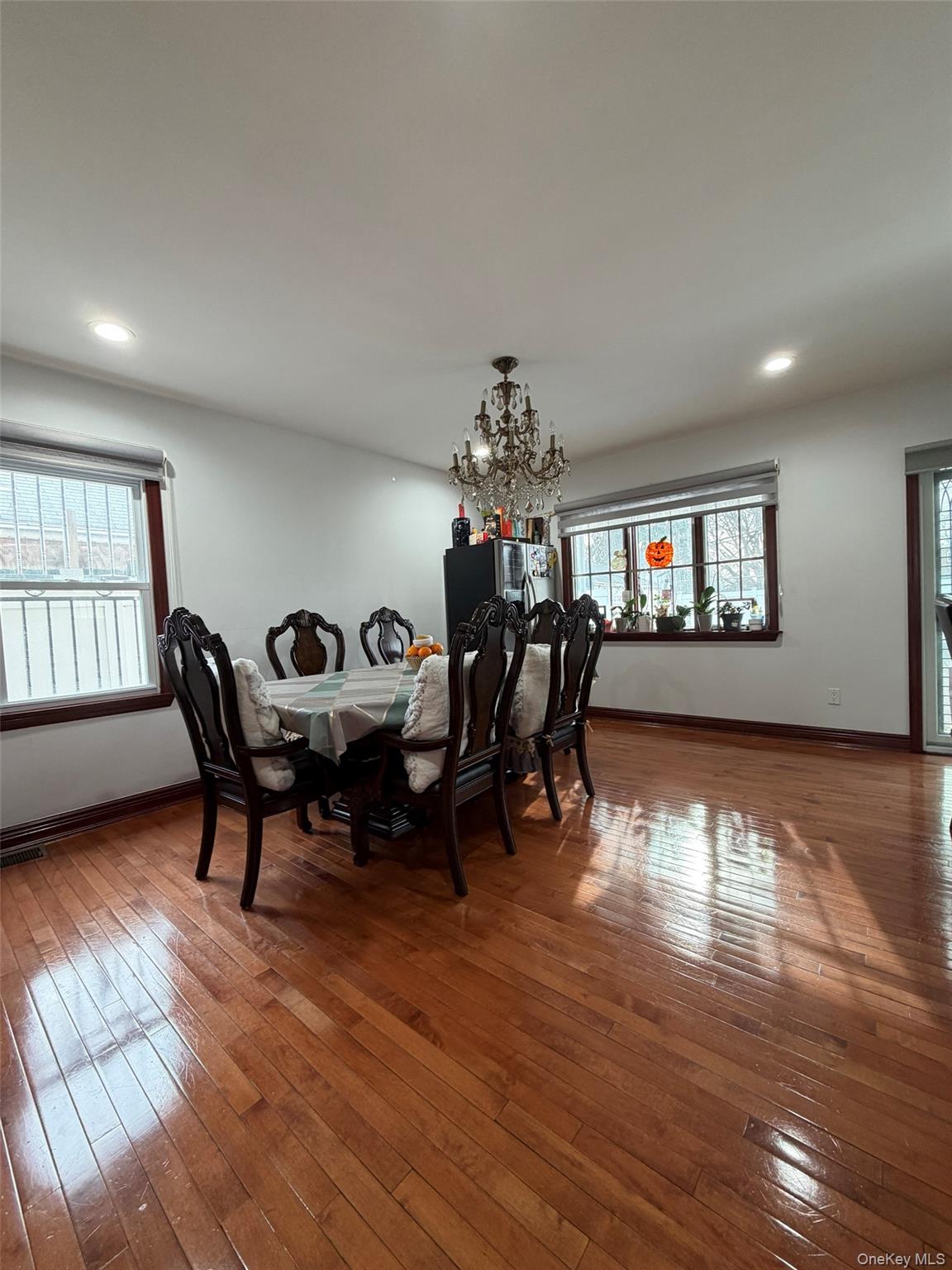 175-28 Underhill Avenue Queens, NY 11365 - Photo 9 of 24 a view of a dining room with furniture window and wooden floor