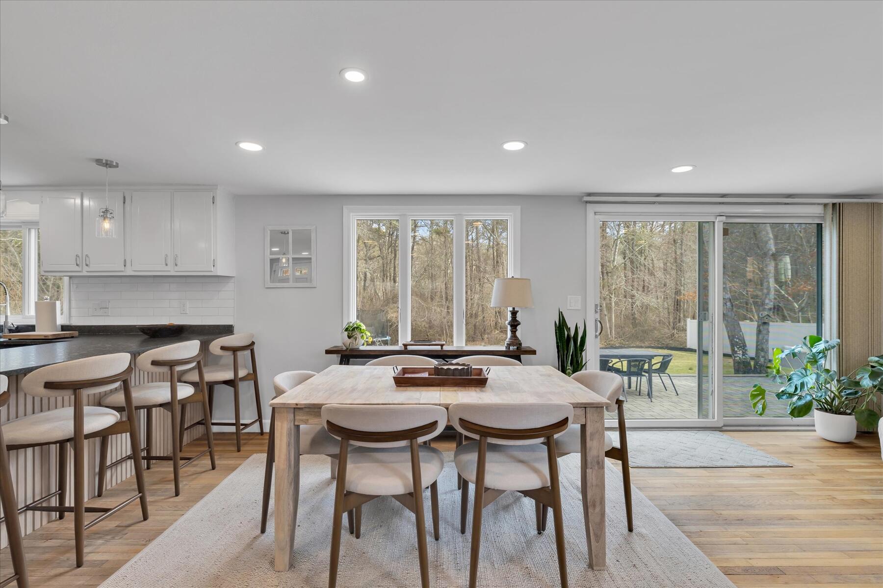 80 Coolidge Road West Yarmouth, MA 02673 - Photo 15 of 37 a view of a dining room with furniture window and outside view