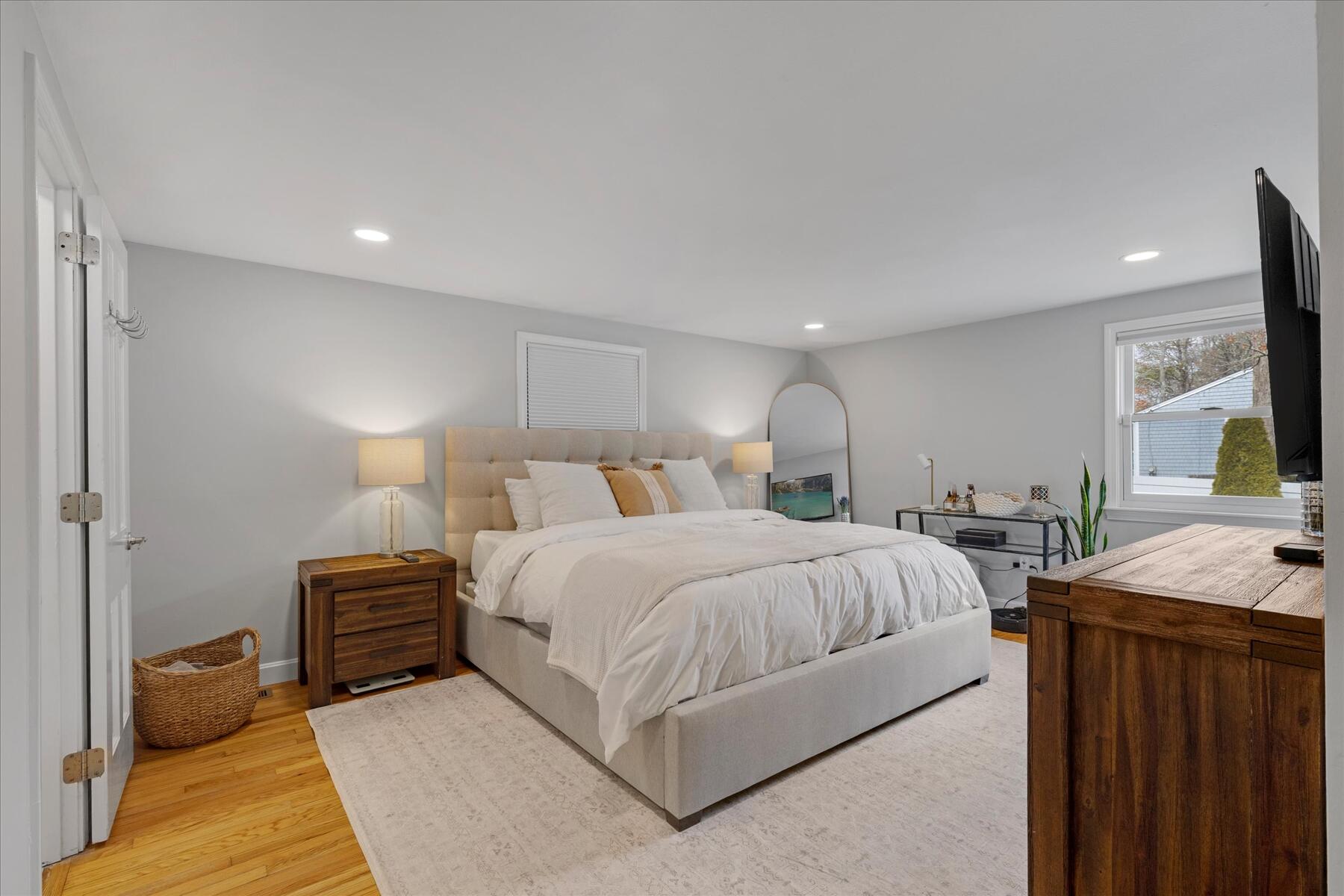 80 Coolidge Road West Yarmouth, MA 02673 - Photo 18 of 37 a bedroom with a bed and a couch