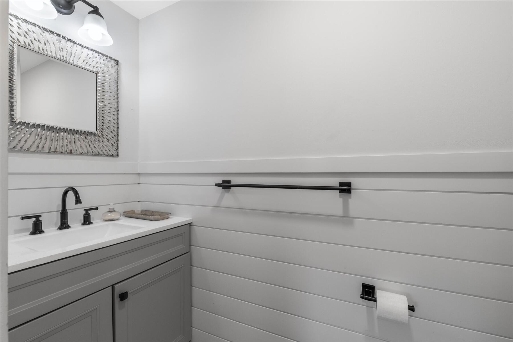 80 Coolidge Road West Yarmouth, MA 02673 - Photo 20 of 37 a bathroom with a sink and a mirror