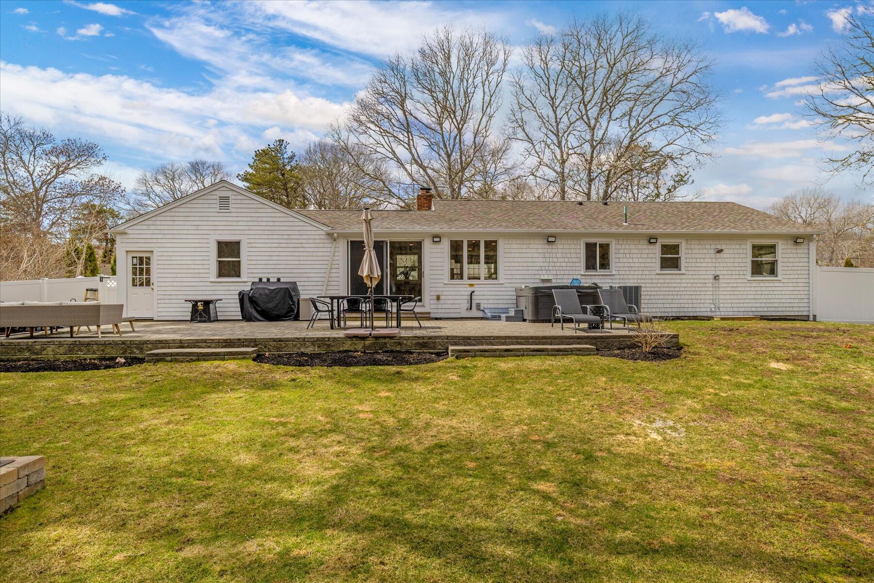 80 Coolidge Road West Yarmouth, MA 02673 - Photo 6 of 37 a view of a house with swimming pool and a chairs
