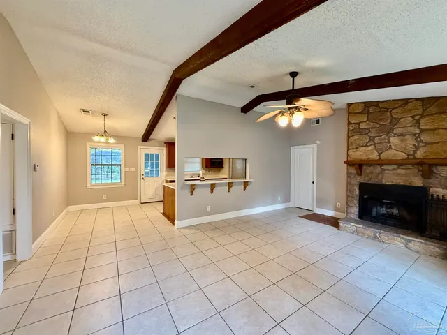 a view of a livingroom with a fireplace