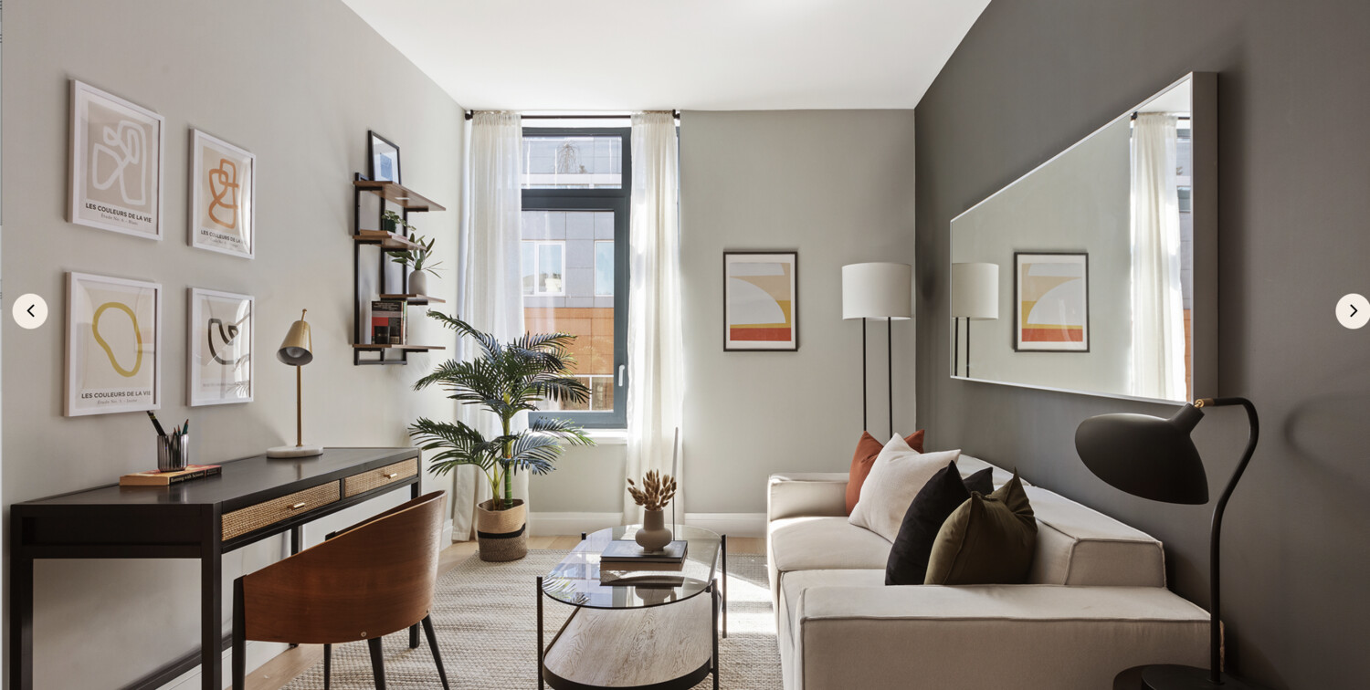 11 West 126th Street, Unit 4 Manhattan, NY 10027 - Photo 12 of 16 a living room with furniture and a window