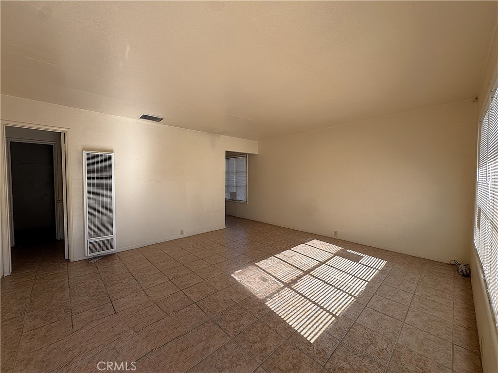 521 East Williams Street Barstow, CA 92311 - Photo 15 of 26 an empty room with an entryway