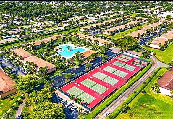 3410 Frosty Way, Unit 4802 Naples, FL 34112 - Photo 26 of 27 Bird's eye view of a pool area