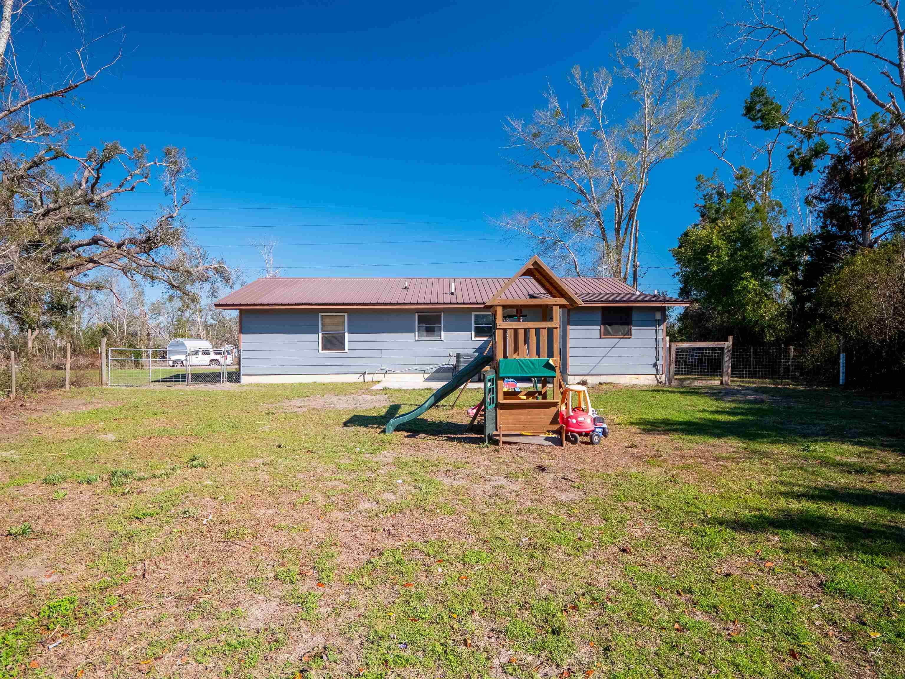 7022 Southeast Farm Road Lee, FL 32059 - Photo 9 of 38 Gallery Image 9