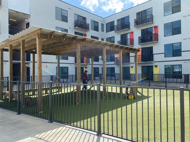 a view of a building with a balcony