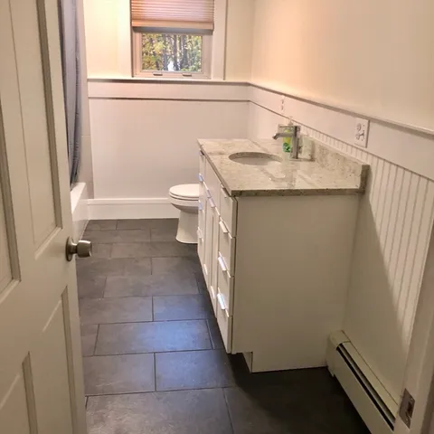 a bathroom with a sink and a vanity