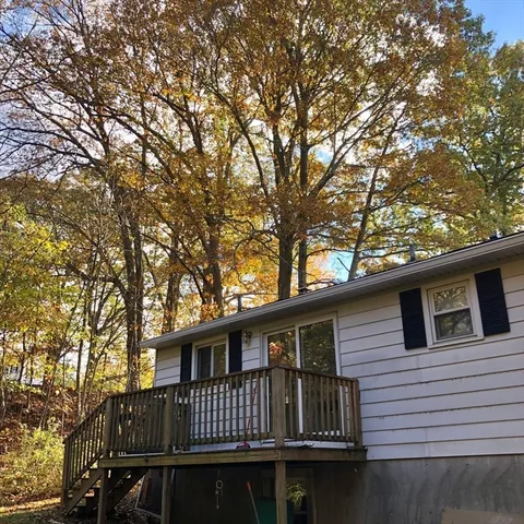 a view of a house with a roof deck