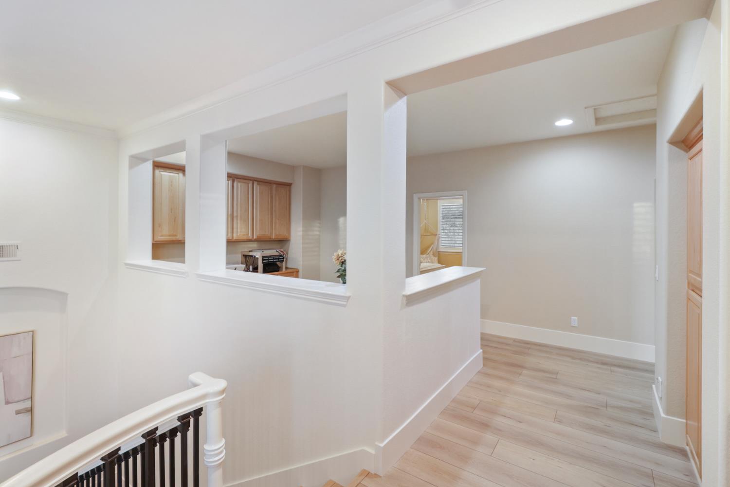 3835 Deer Ridge Lane Auburn, CA 95602 - Photo 46 of 79 a view of hallway with window and wooden floor