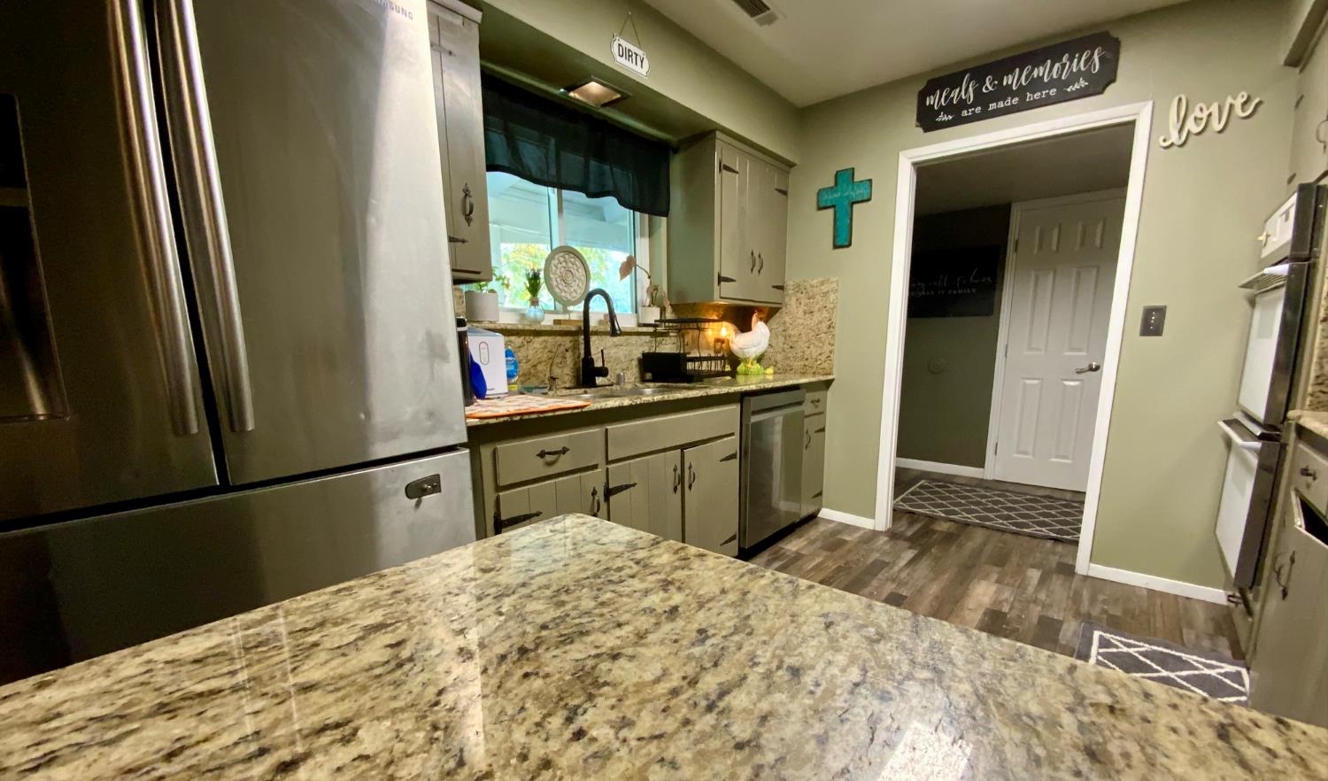 48833 Rock Point Road Oakhurst, CA 93644 - Photo 6 of 36 a bedroom with a bed and a large mirror