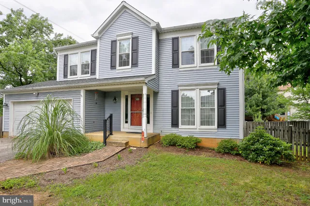front view of a house with a small yard