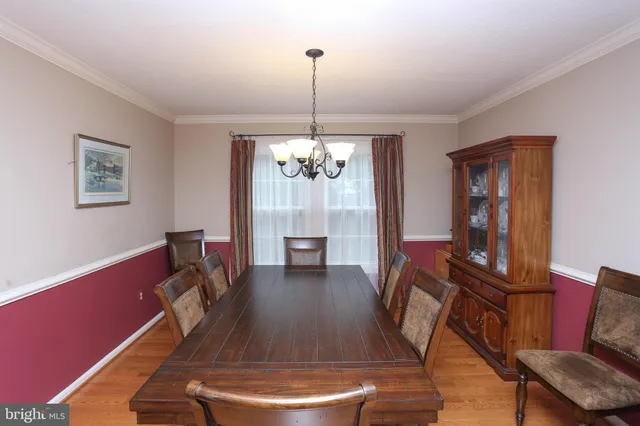 a room with furniture and a chandelier
