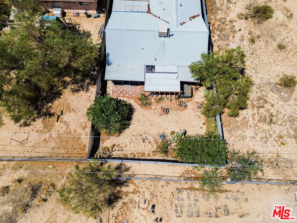 62033 Bonair Road Joshua Tree, CA 92252 - Photo 49 of 53 an aerial view of a house with a yard