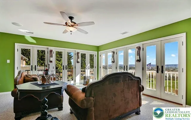 a view of a chairs and table in a patio