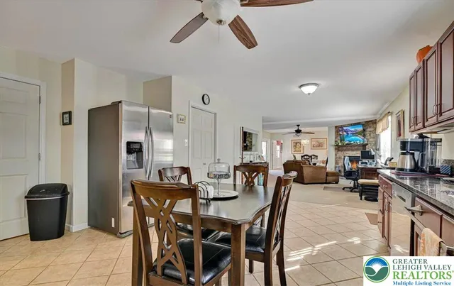 a view of a living room and kitchen