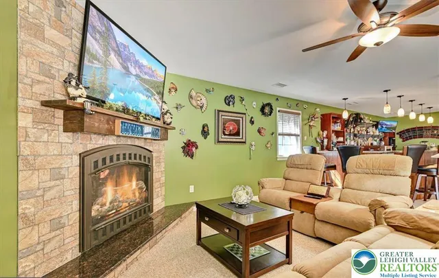 a bedroom with two beds and a window