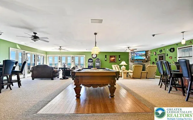 a front view of a house with outdoor seating