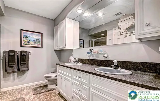 a workspace with furniture and closet