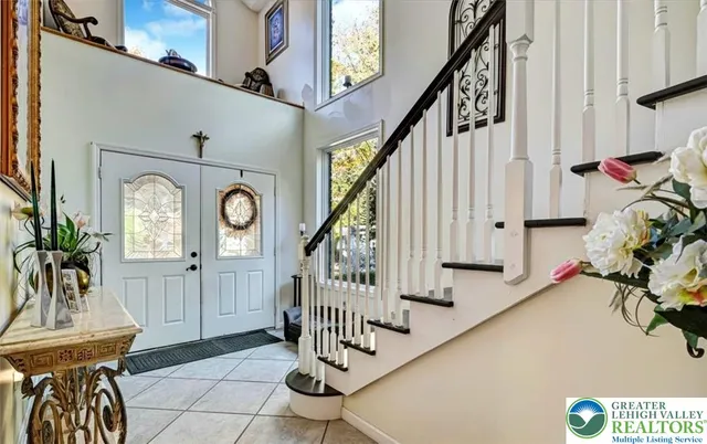 a kitchen that has a sink and a stove in it