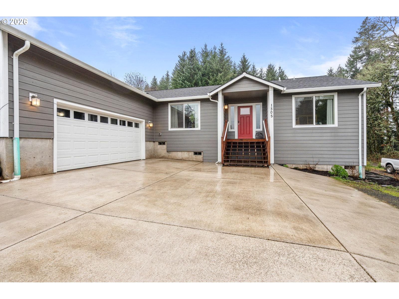 1305 Southwest Illihe Road Dallas, OR 97338 - Photo 1 of 1 a front view of a house with yard