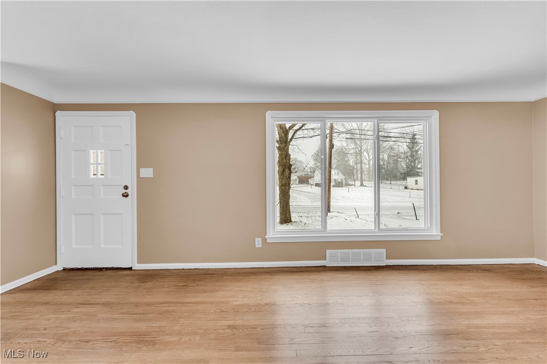 4693 Liberty Road South Euclid, OH 44121 - Photo 4 of 33 Entryway with plenty of natural light and light wood finished floors