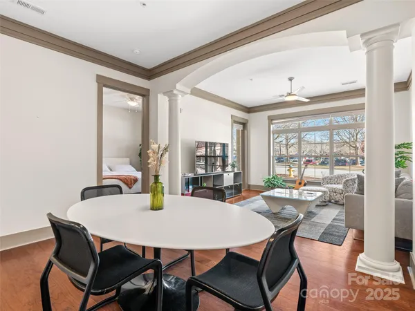a view of a dining room with furniture window and outside view