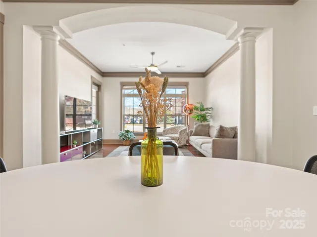 a kitchen with a sink and refrigerator