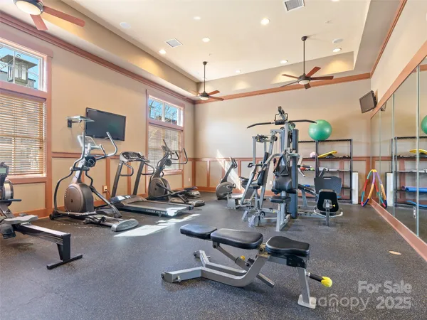 a view of a swimming pool with a lawn chairs