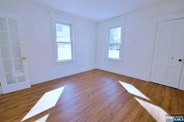 a view of entryway with wooden floor