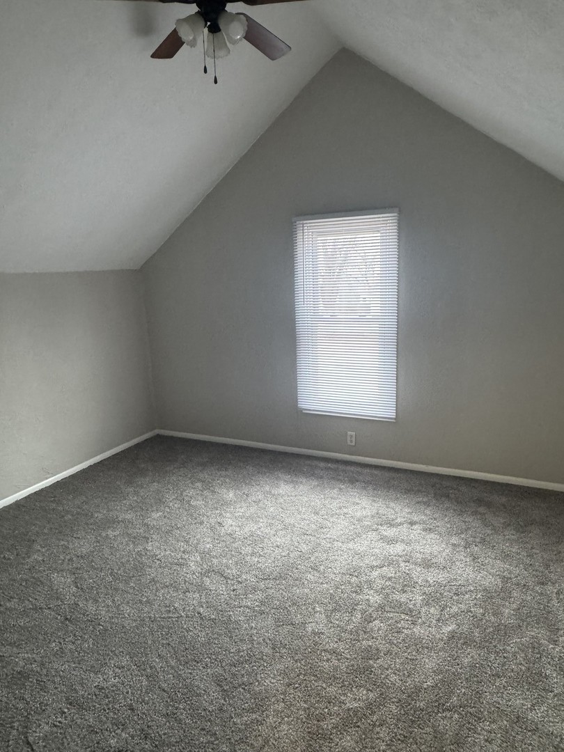 108 East Cleveland Street Heyworth, IL 61745 - Photo 9 of 13 an empty room with a window