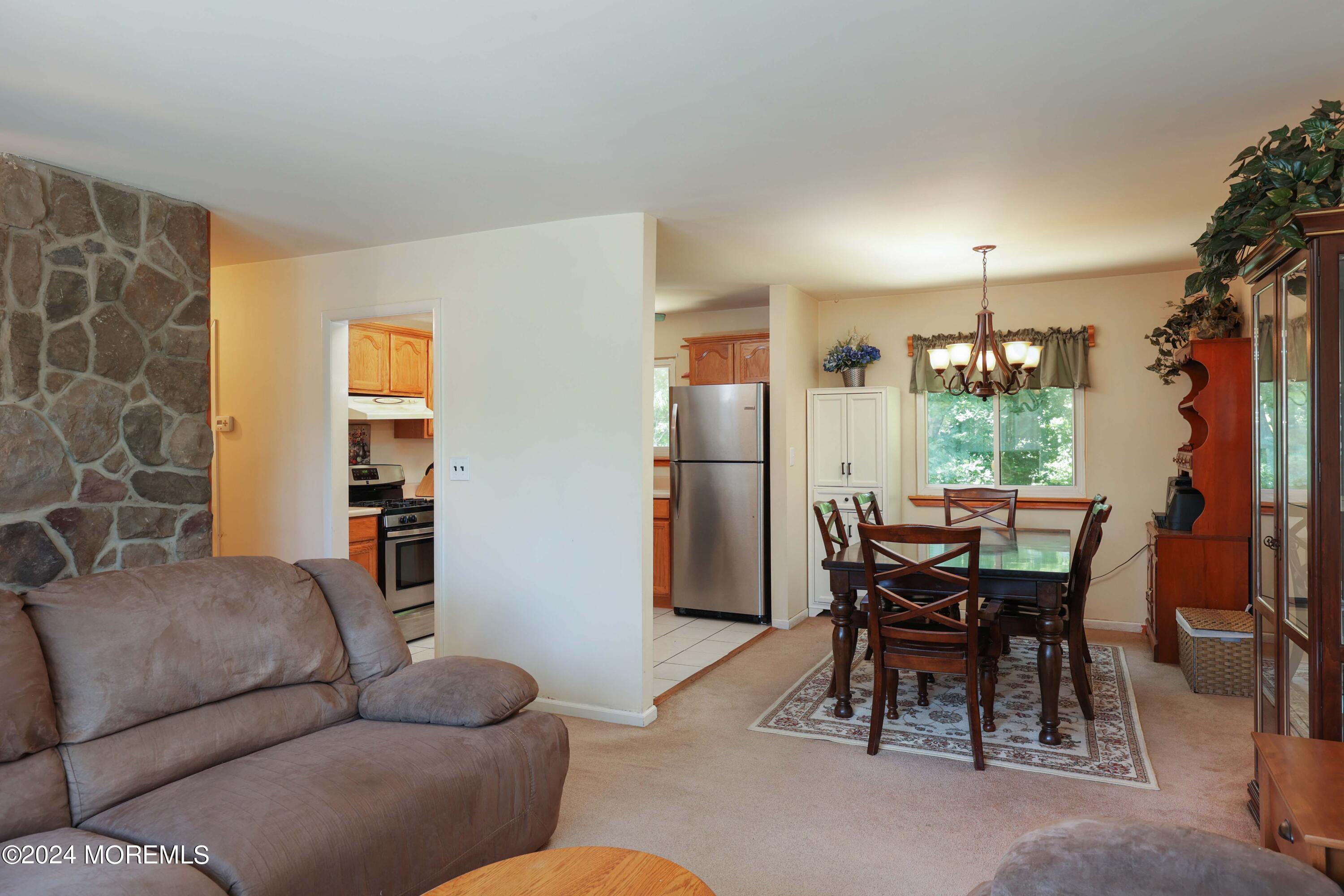 262 Cedar Swamp Road Jackson, NJ 08527 - Photo 5 of 28 a living room with furniture and a window
