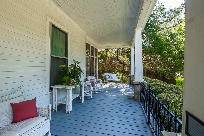 Unwind on a spring day on this wrap around porch.