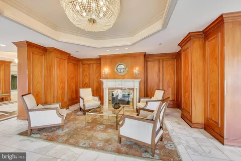a view of a livingroom with furniture and windows