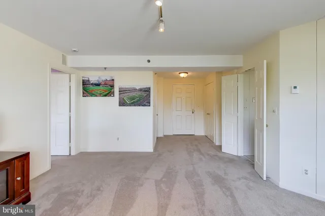 a view of roof deck with furniture