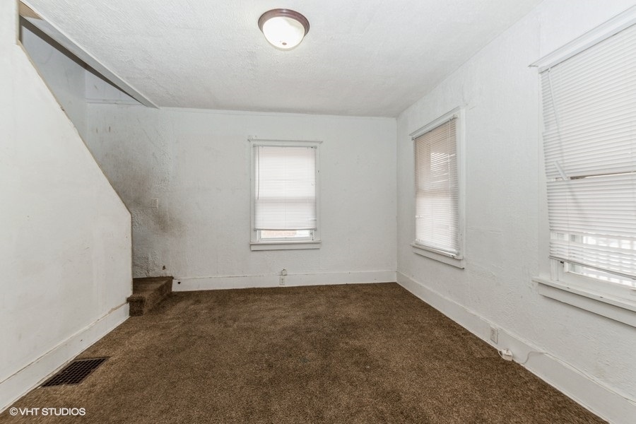 1436 West 110th Place Chicago, IL 60643 - Photo 4 of 10 an empty room with windows