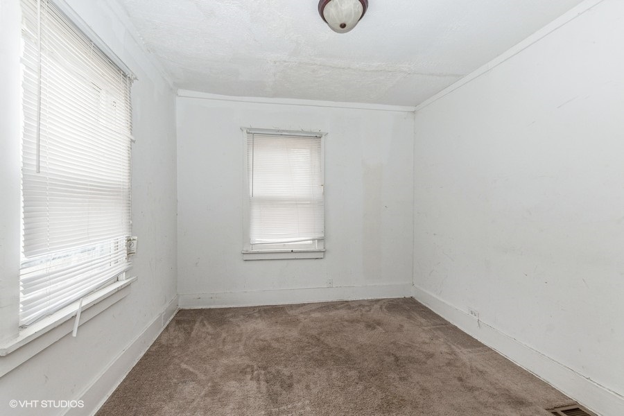 1436 West 110th Place Chicago, IL 60643 - Photo 5 of 10 an empty room with a window
