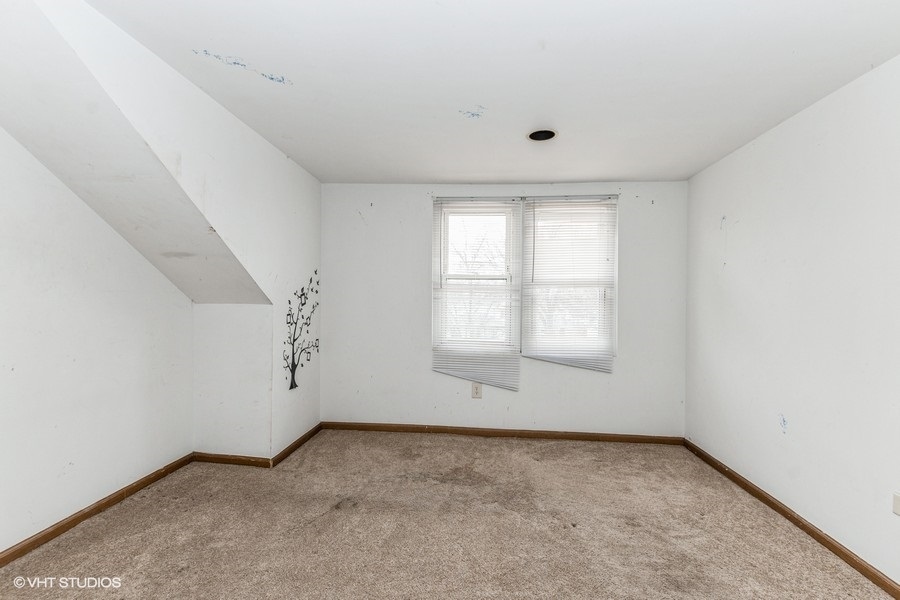1436 West 110th Place Chicago, IL 60643 - Photo 6 of 10 an empty room with a window
