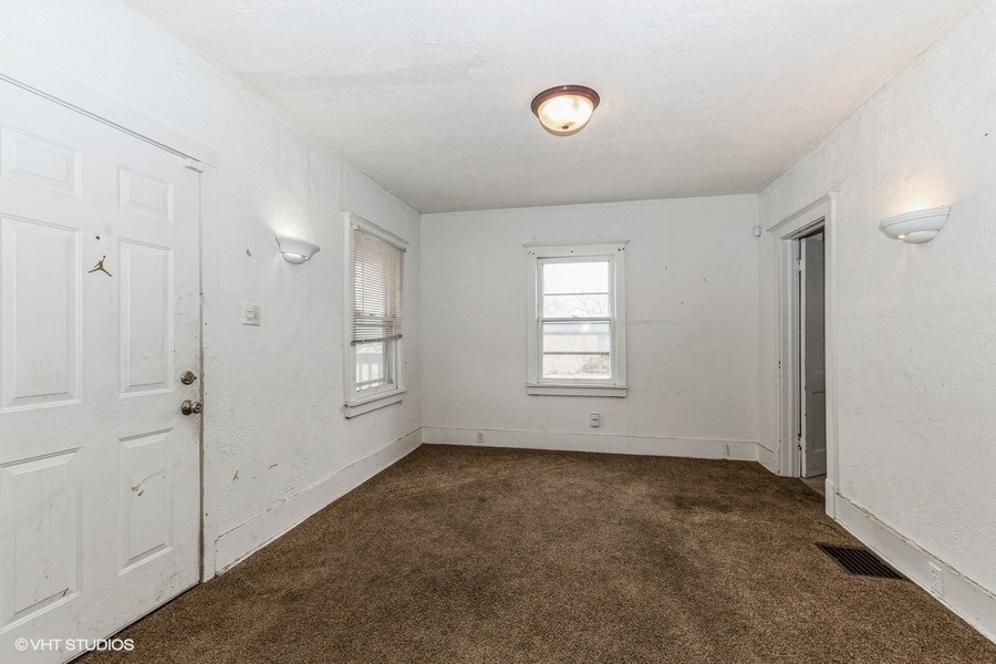 1436 West 110th Place Chicago, IL 60643 - Photo 9 of 10 a view of room with window and ceiling fan