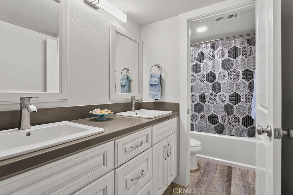 34110 Selva Road, Unit 328 Dana Point, CA 92629 - Photo 18 of 33 a bathroom with a sink and a mirror