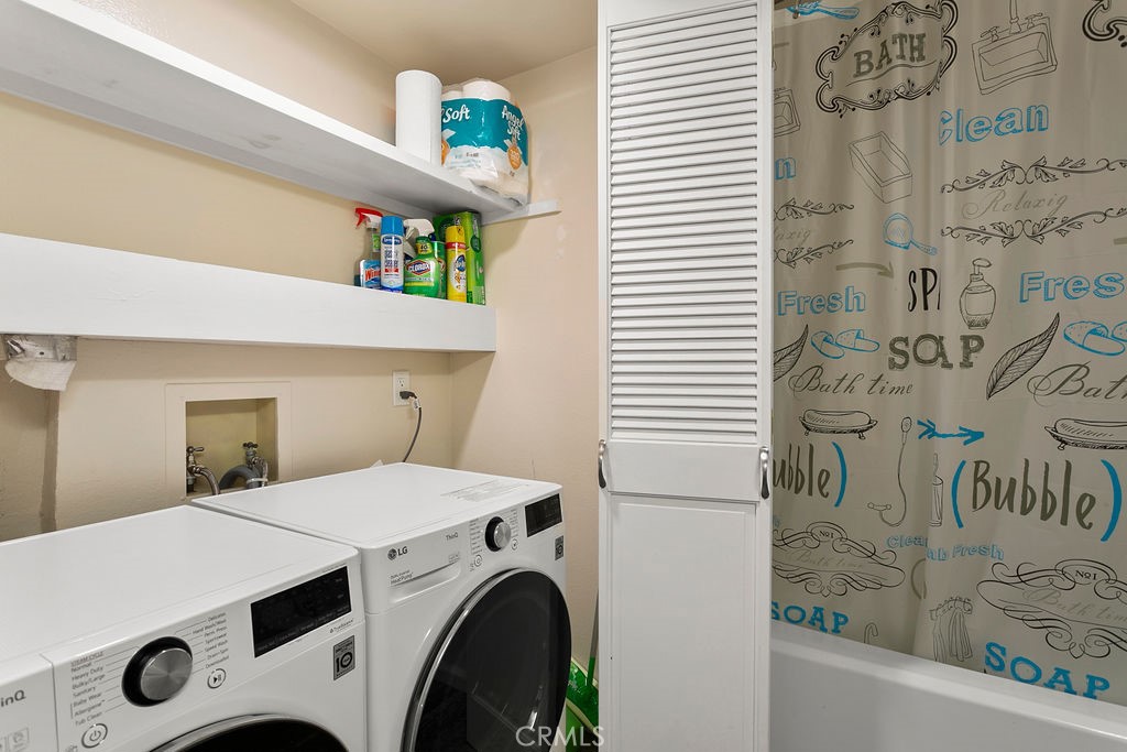 34110 Selva Road, Unit 328 Dana Point, CA 92629 - Photo 21 of 33 a utility room with dryer and washer