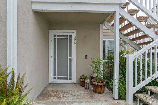 a view of a potted plants in front of a house